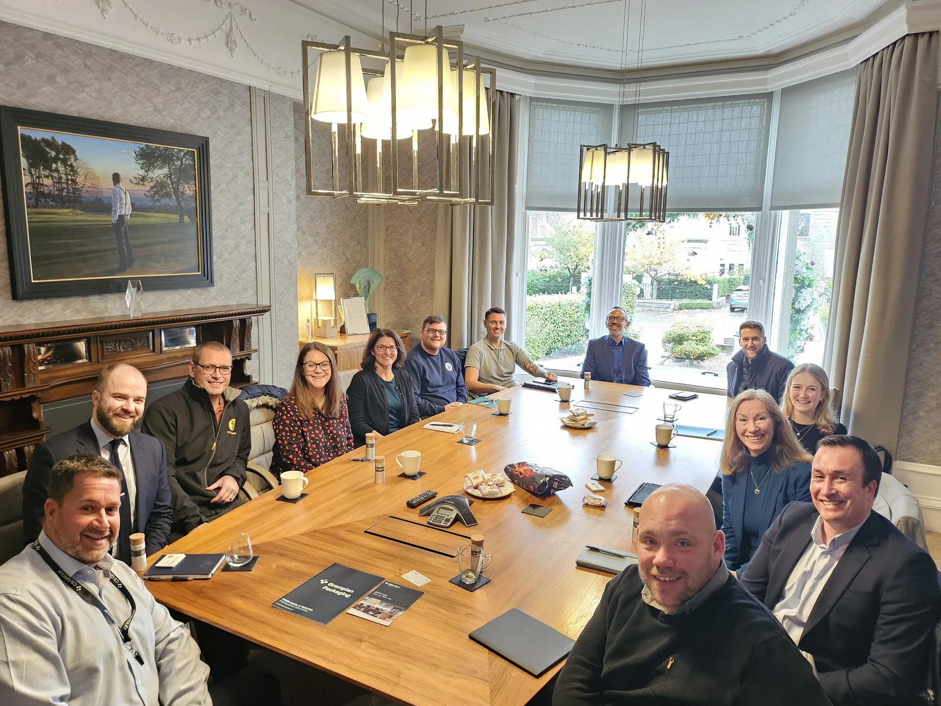 Aberdeen Ten group meeting with chandelier
