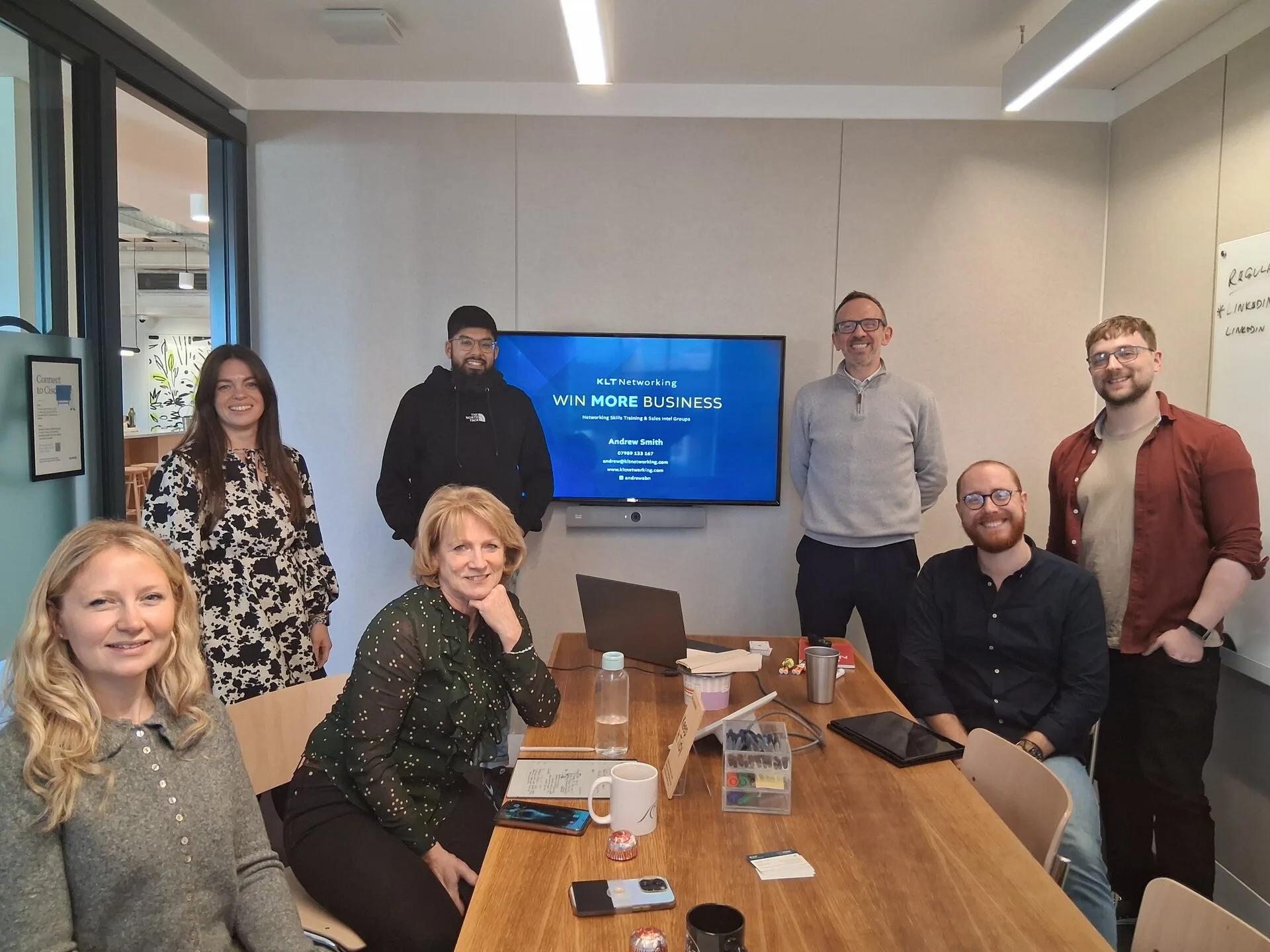 KLT group training session with presentation screen